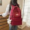 Schoolbag Large capacity schoolbag for men and women, junior high school students, campus solid color backpack, Japanese versatile college student 