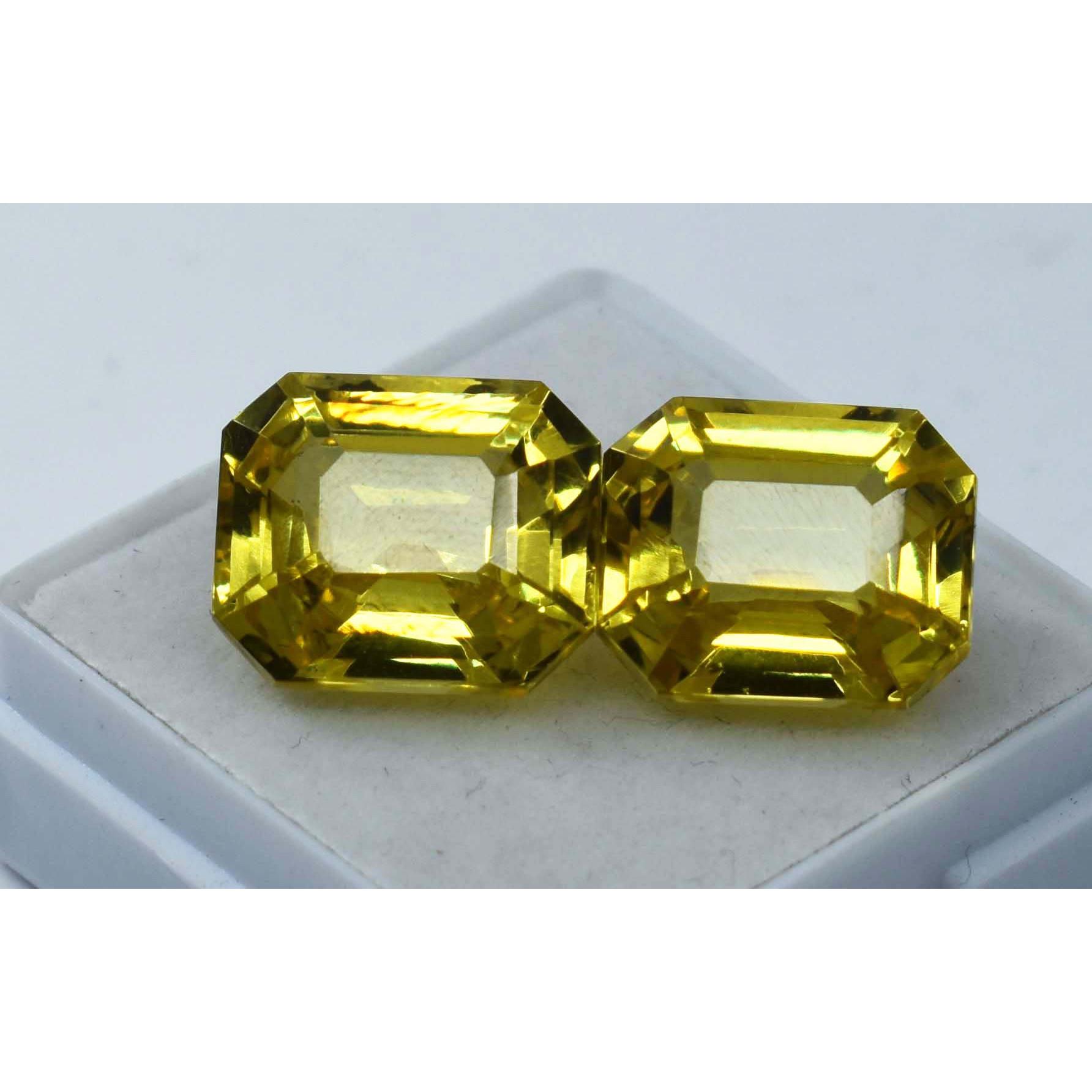 

Сапфірово-жовтий сипучий дорогоцінний камінь 21.25 карата Натуральний СЕРТИФІКОВАНИЙ Смарагдової форми Пара A-1478 12.2 mm each approx жовтий