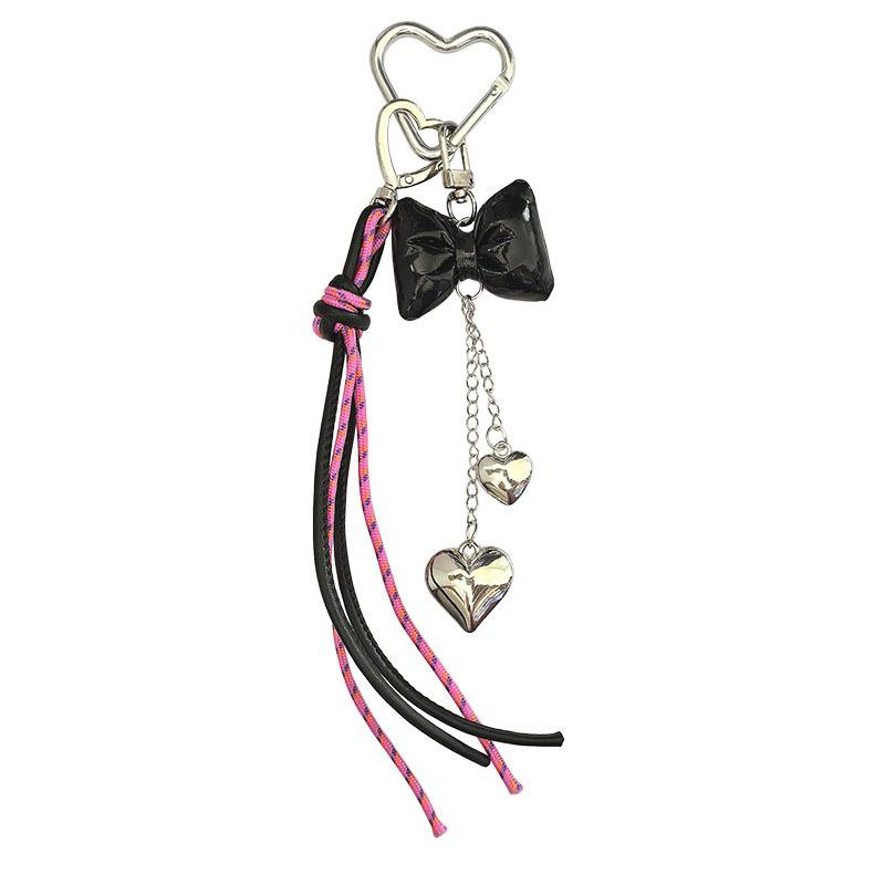 New Leather Heart Pendant Bag Keychain with Braided Rope and Bow Design