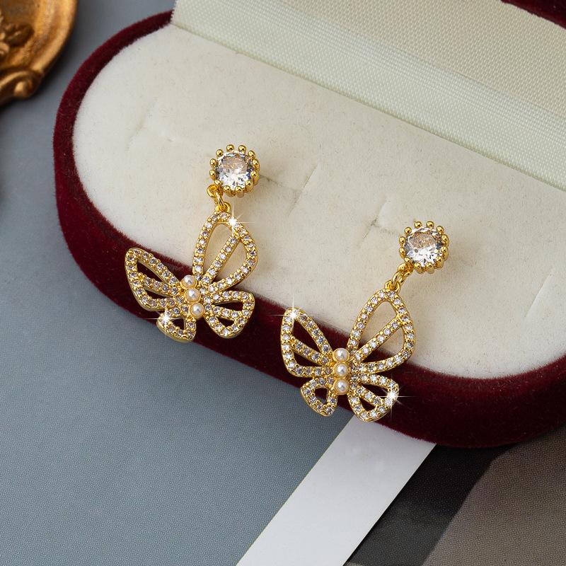 Pearl butterfly earrings women's zircon hollow high-end light luxury earrings exquisite and sweet personality fashion temperament earrings