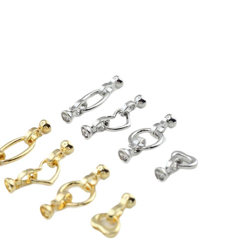 Naszyjnik i łącznik do bransoletki w kształcie owalnego brzoskwiniowego serca zachowujący kolor z podwójnym zapięciem