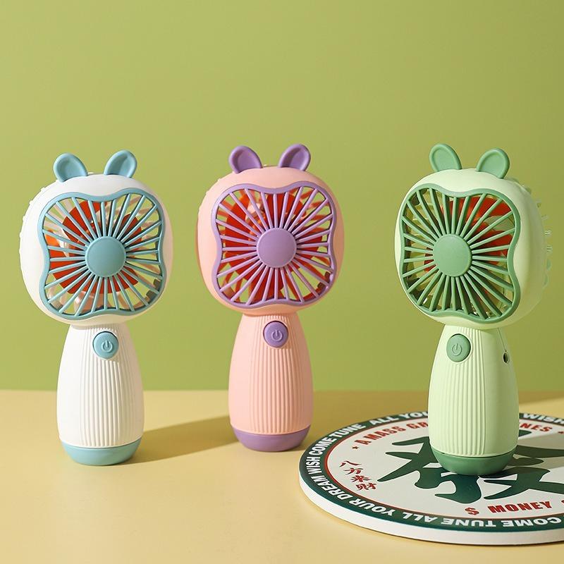 

Новый креативный маленький вентилятор, USB-интерфейс для зарядки, мультяшный милый студент, большой ветер, портативный маленький вентилятор зелёный