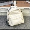 Trendy brand niche design backpack for men and women, lightweight weight weight reduction schoolbag, female college student travel small iPad backpack