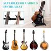 The GUITTO Plastic Multi Guitar Rack Stand is a foldable universal display rack for band and stage and can hold acoustic a portable guitar holder 3
