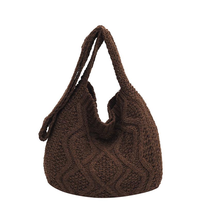 

Exquisite straw woven personalized wavy pattern solid color women s shopping bag spring new hollow shoulder messenger bag темно-коричневого кольору