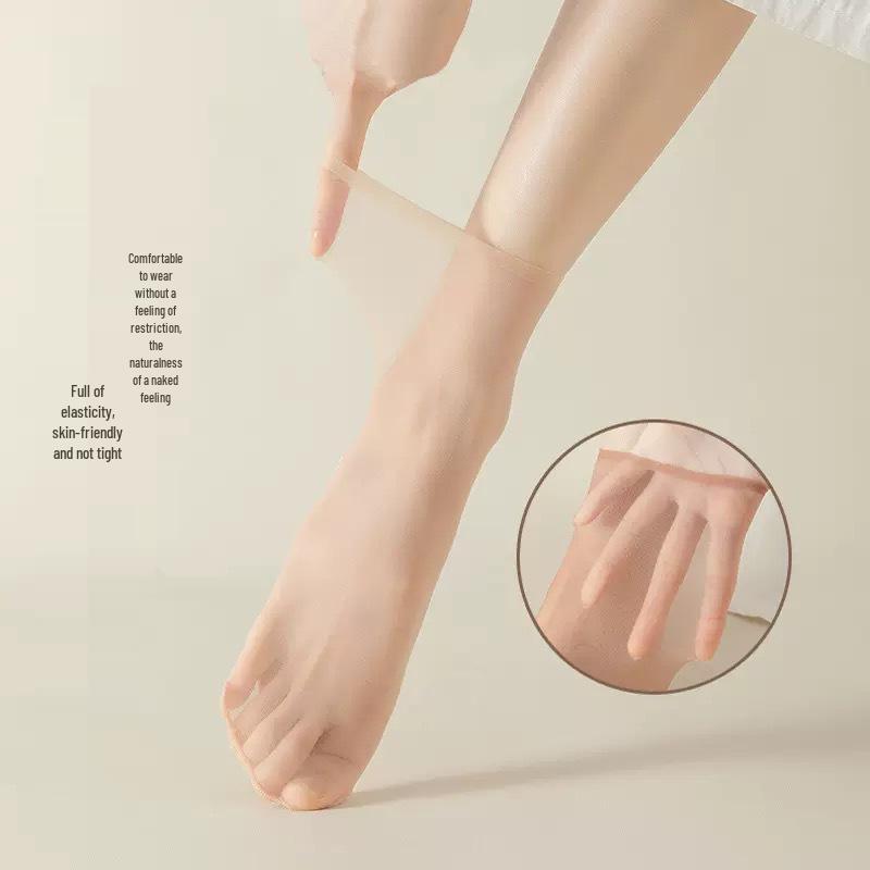 Röda prickiga spetsover-the-knee-strumpor med rosettstrumpband för skönhet och stil