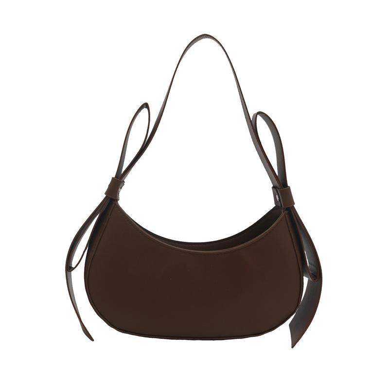 

Bag women s new popular niche design bow crescent bag premium texture portable messenger bag versatile темно-коричневого кольору