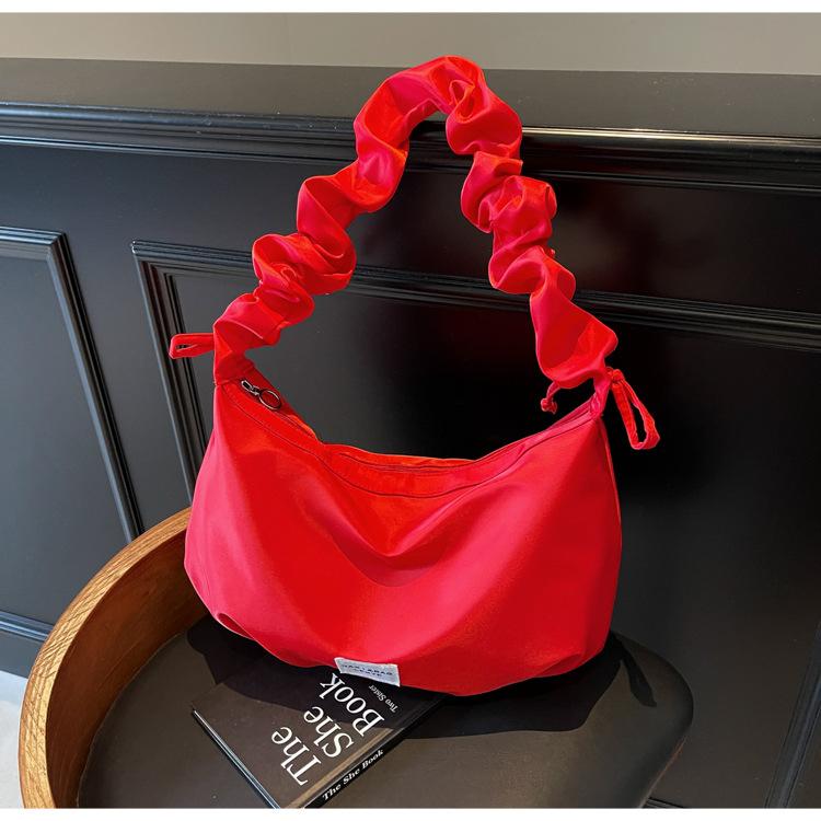

New cute large-capacity one-shoulder oblique span dumpling bag fashionable girl casual girl bag бордовий