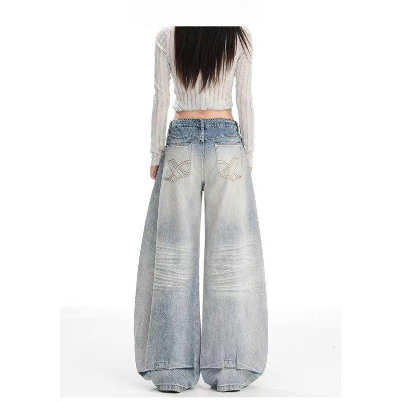 Blue washed scimitar jeans women's new pocket embroidery design three-dimensional cat whisker loose and thin wide-leg pants