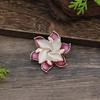 New enamel color hollow geometric camellia magnetic brooch women's fashion versatile three-dimensional flower corsage
