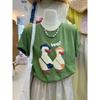 T-shirt pour femme vert avec imprimé canard de dessin animé à manches courtes décontracté coupe ample haut d'été