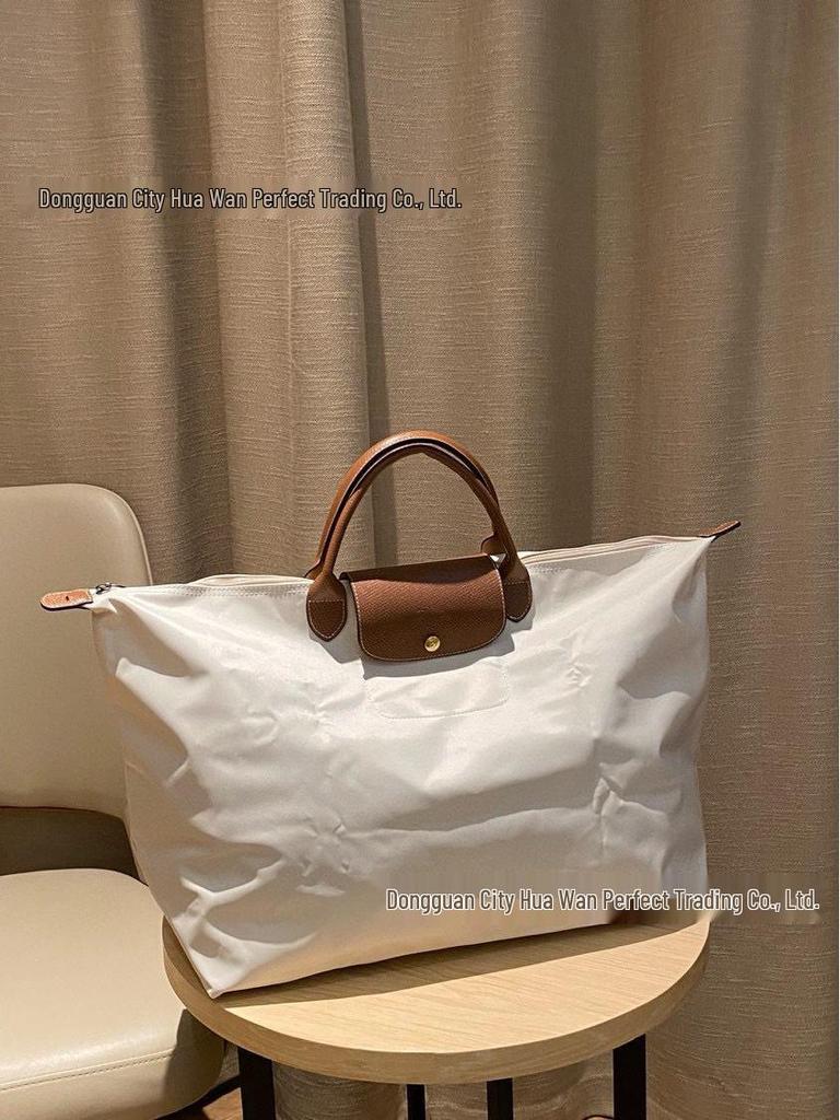 Xiangjia Large-Capacity Waterproof Oxford Travel Tote Bag, Lightweight and Foldable.
