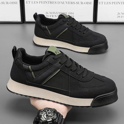Pánske bežné športové bežecké topánky Nové kožené všestranné protišmykové úplne čierne trendy tenisky z pevninskej Číny Retro doska Módne
