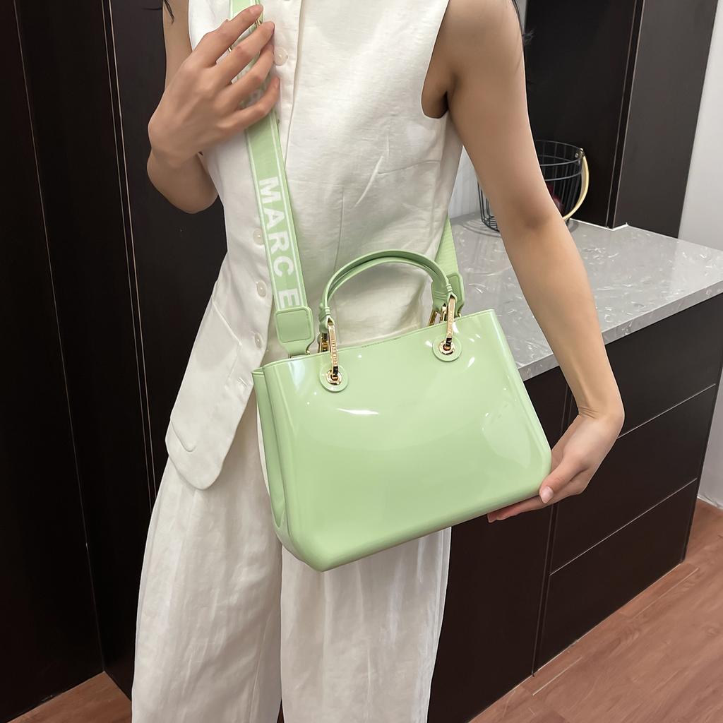 New fashion high-end sense solid color pvc commuter bag portable shoulder messenger temperament women's bag