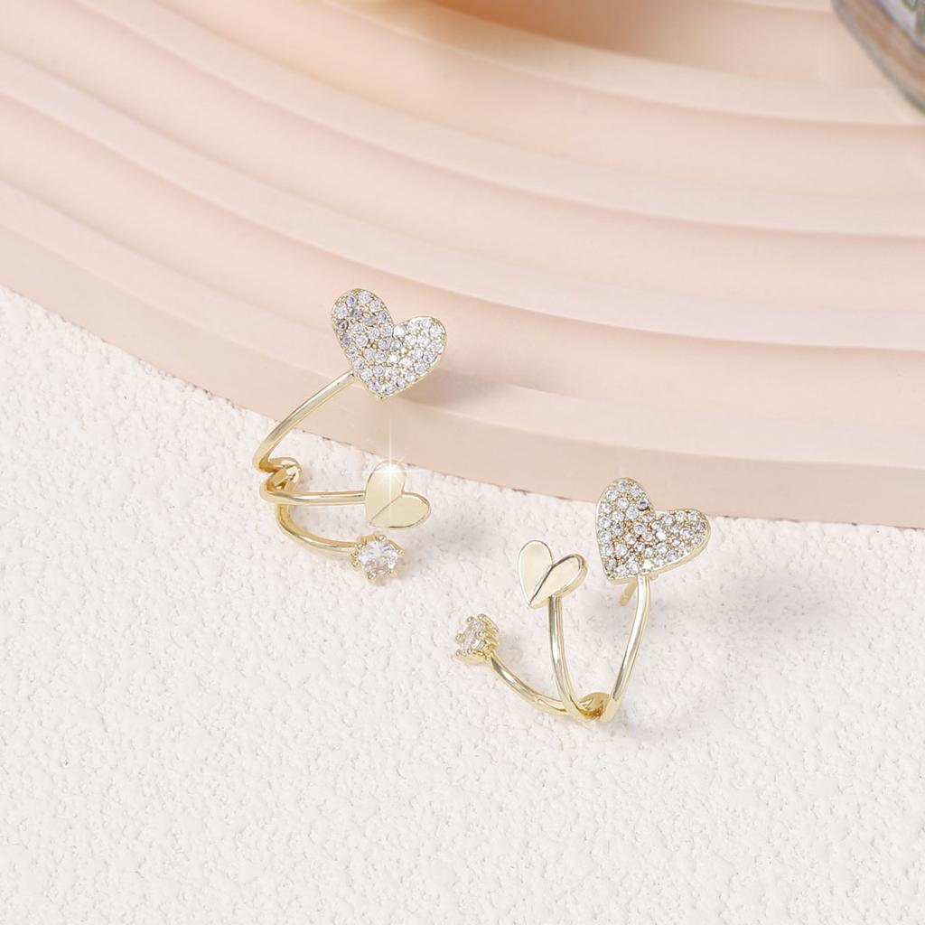 Korean version of the new niche design zirconium diamond double love three-line fishtail exquisite earrings, double peach heart simple model