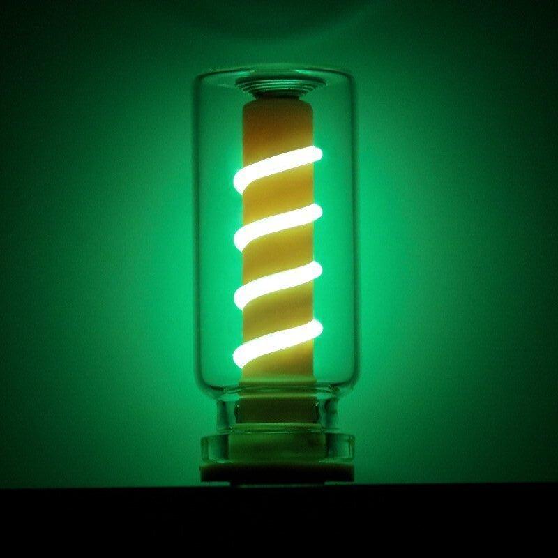

A transparent spring-touch dimmable USB mood lamp featuring retro-style LED ambient lighting design. зеленый свет