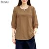 Blusa informal holgada de color liso con cuello redondo y mangas 3/4 para mujer