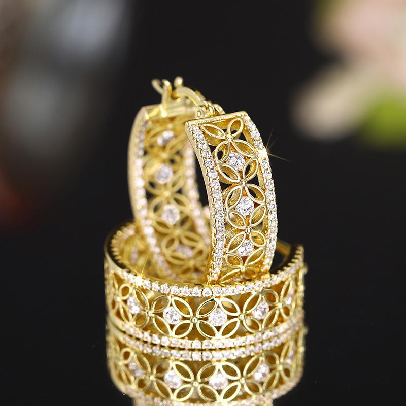 

Huitan Hollow Flower Pattern Design Women s Hoop Earrings Luxury Gold Color Bridal Earrings Dazzling CZ Wedding Trendy Zircon