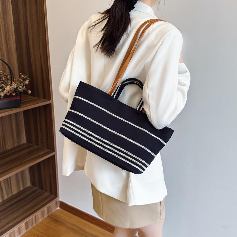 New niche design simple striped shopping bag tote bag portable shoulder trendy women's bag