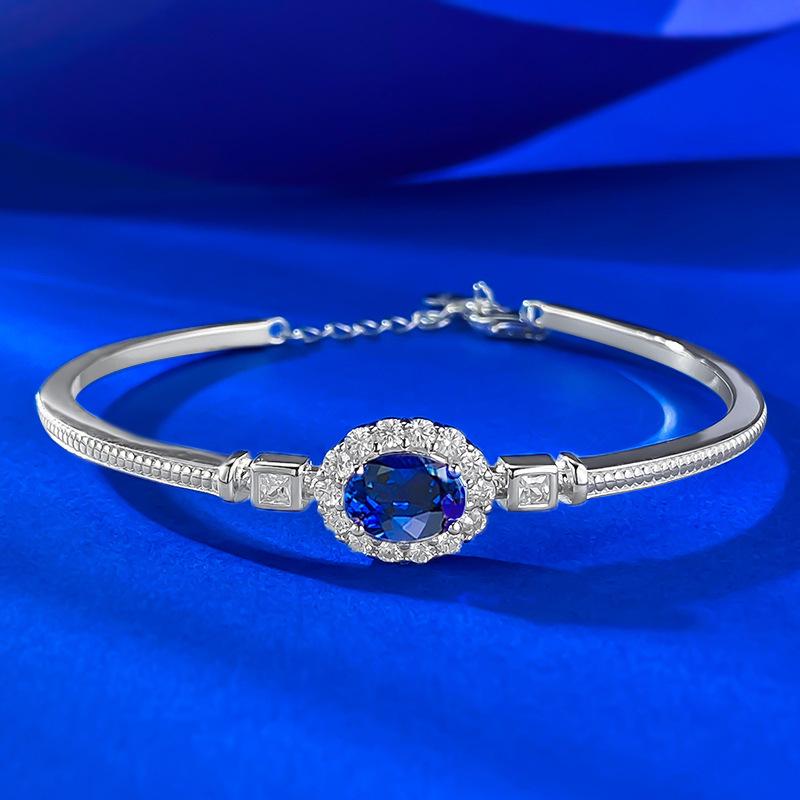 

Браслет Zhuozhifan из серебра 925 пробы с имитацией синего сапфира - Корундовый браслет-манжета 6x8 мм 16cm