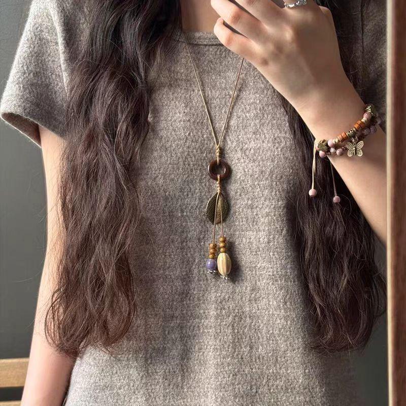 Korean Pearl Necklace: High-End Silver Clavicle Chain with Niche Design, Perfect for Light Luxury and Sweater Pendants.