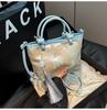 2026 National Chinese Style Spring New Embroidery Personality Western Design Texture Women's Single Shoulder Handheld Bucket Bag