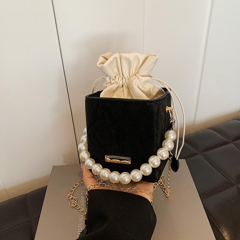 2025 spring and summer new drawstring fashion Korean version of gentle texture pearl chain handbag versatile ins messenger bag women