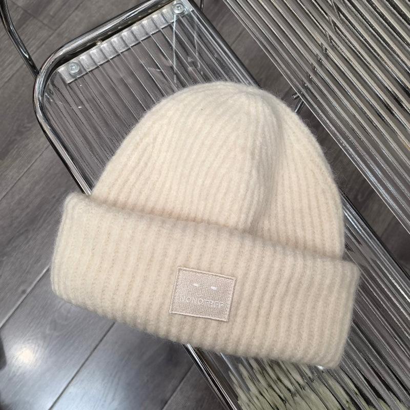 Autumn and winter wool hat women's loose sticker big head circumference beige cold hat warm and thickened new ear protection knitted hat
