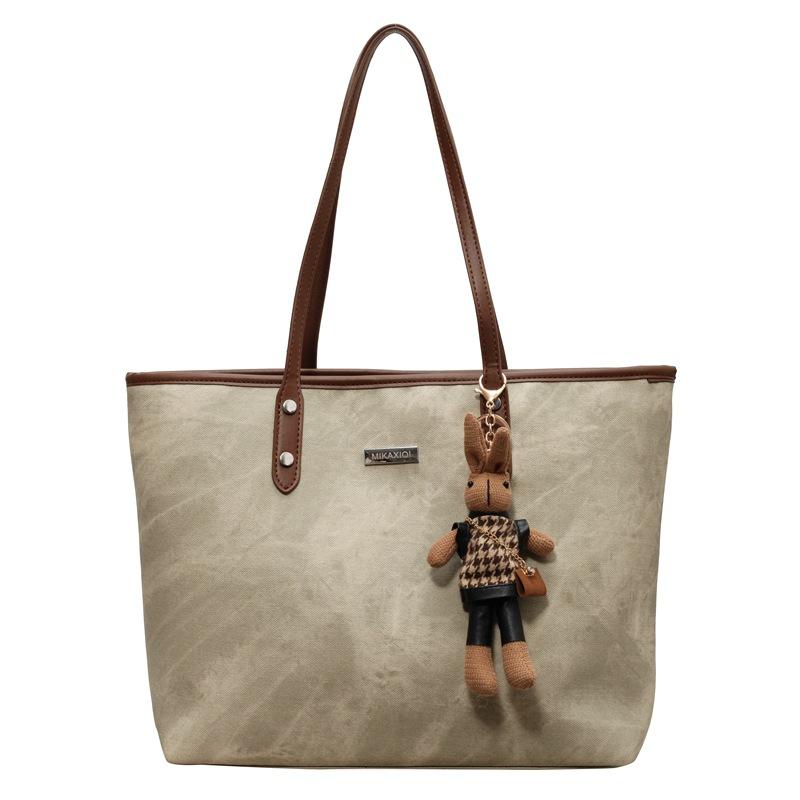 

Вінтажна жіноча сумка через плече коричневий/бежевий