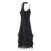 Vestito da donna a pois con bordo a balze
