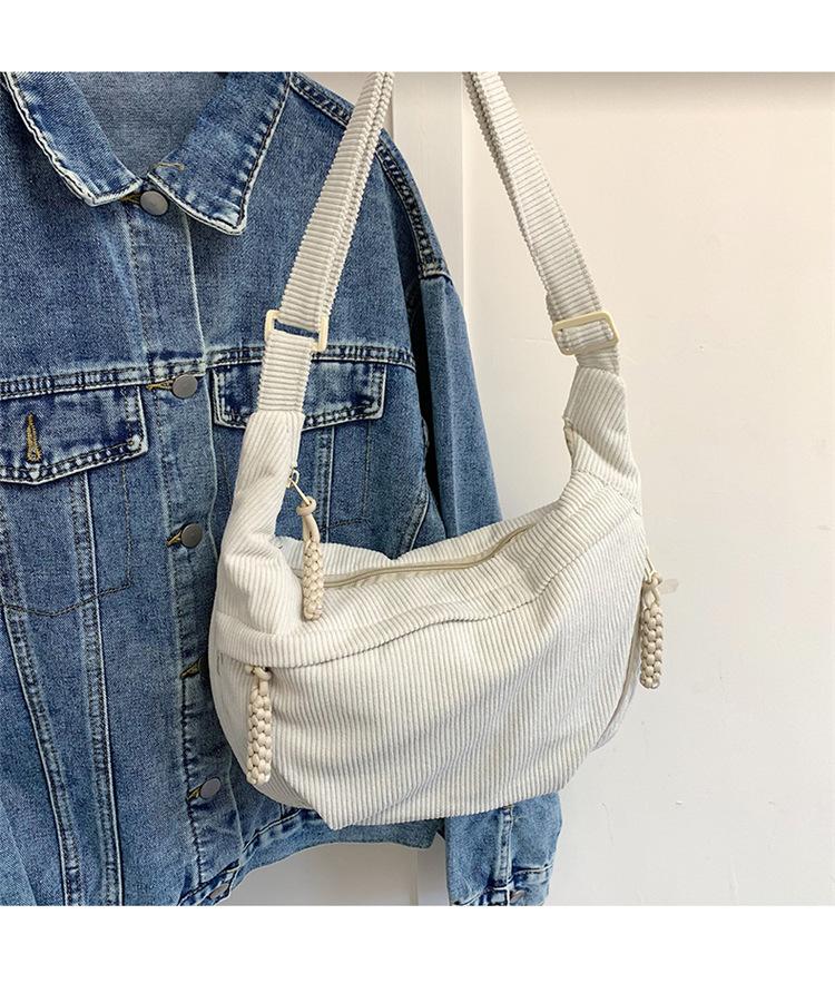 

2025 spring new simple large-capacity messenger bag female student small satchel sports versatile backpack dumpling bag