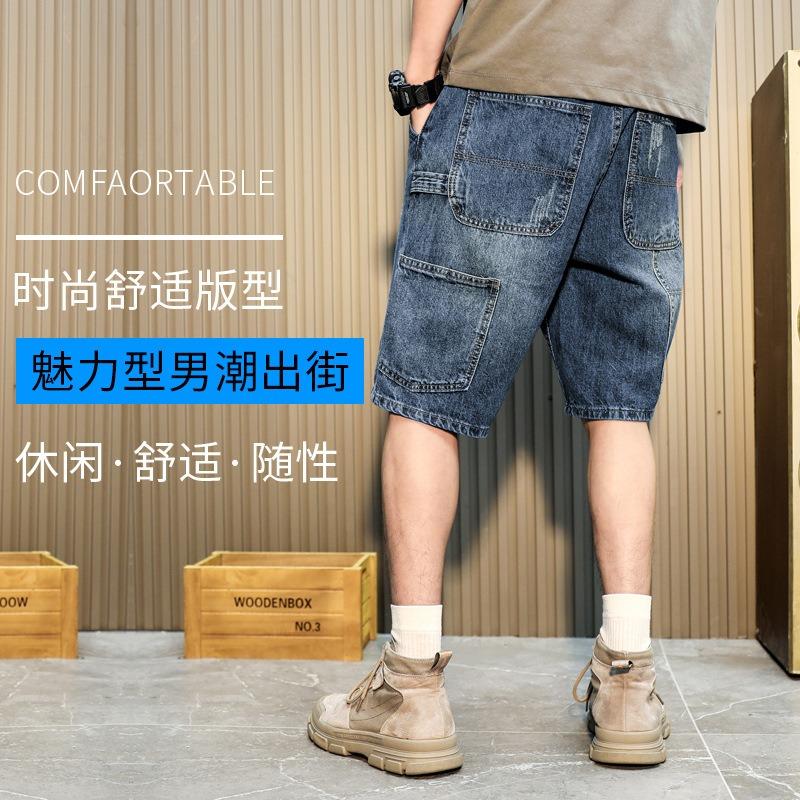Pantaloncini di jeans da uomo, estivi sottili larghi dritti casual alla moda marca strappati cinque o sei divisione del lavoro pantaloni da uomo
