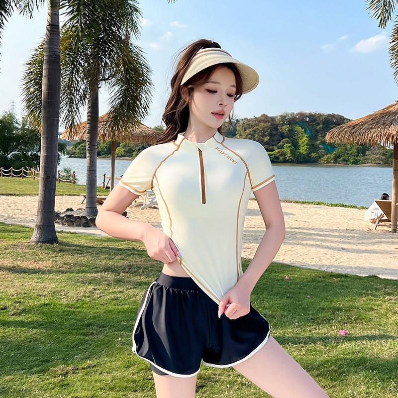 Womens Modest Two-Piece Swim Set With Short Sleeve Top Boxer-Style Bottoms Light Striped Design Swimming Fitness Running