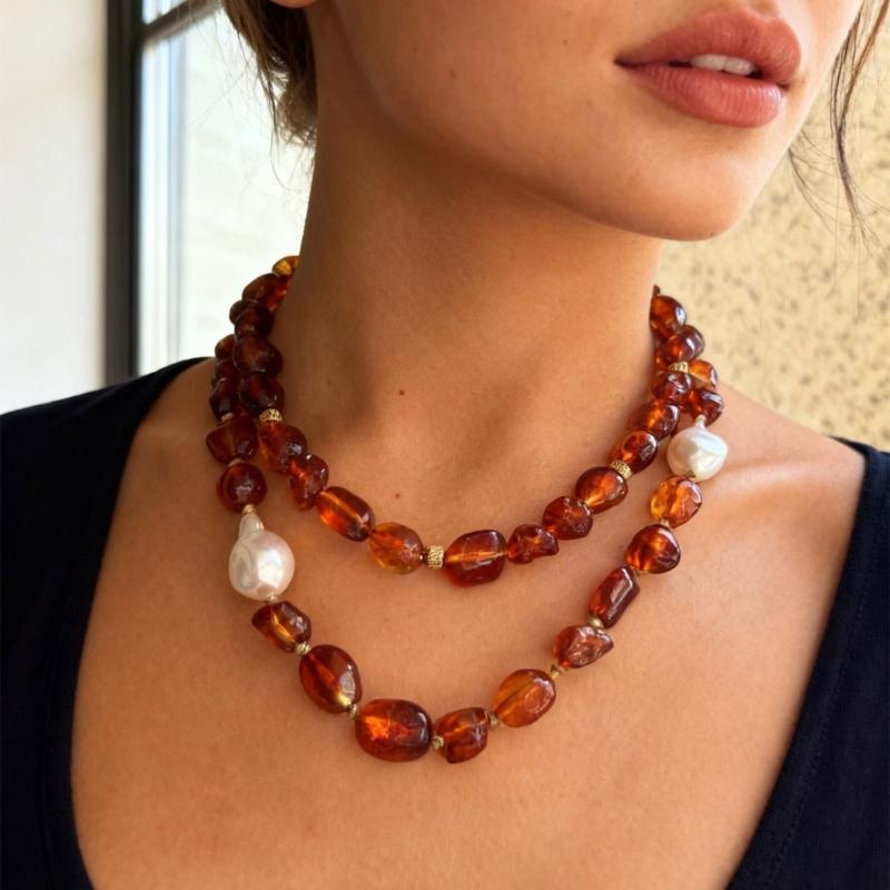 Stylish Red Resin Irregular Bead Necklace With Adjustable Length For Personalized Fit And Artistic Design In Sturdy Alloy Construction.