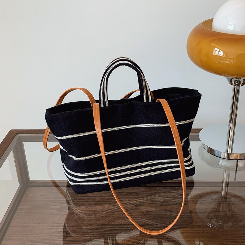 New niche design simple striped shopping bag tote bag portable shoulder trendy women's bag