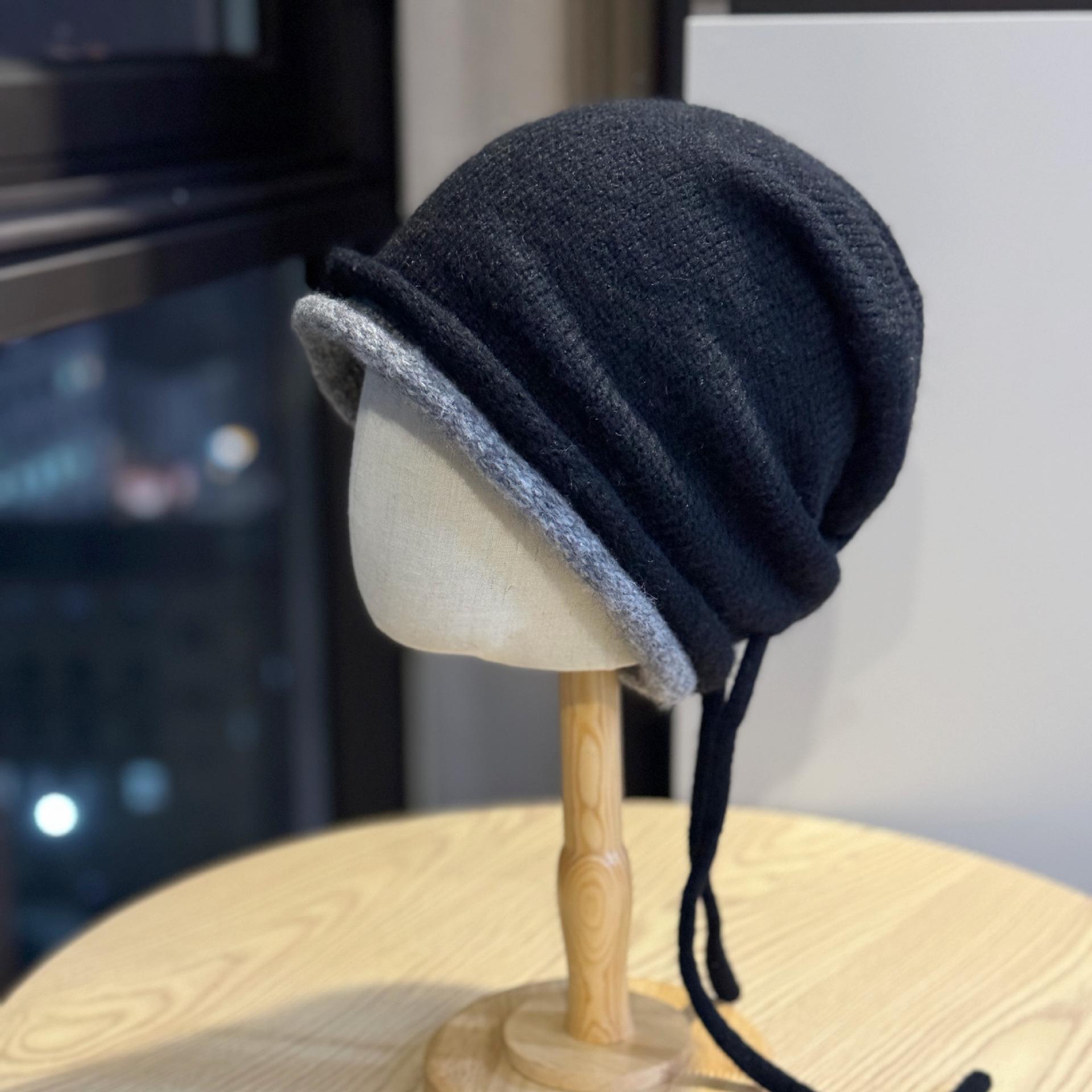 

Korean-style autumn and winter drawstring rolled-edge knitted hat for women, simple and warm, makes the head look smaller, beanie hat Adult54-60Average Size чёрный