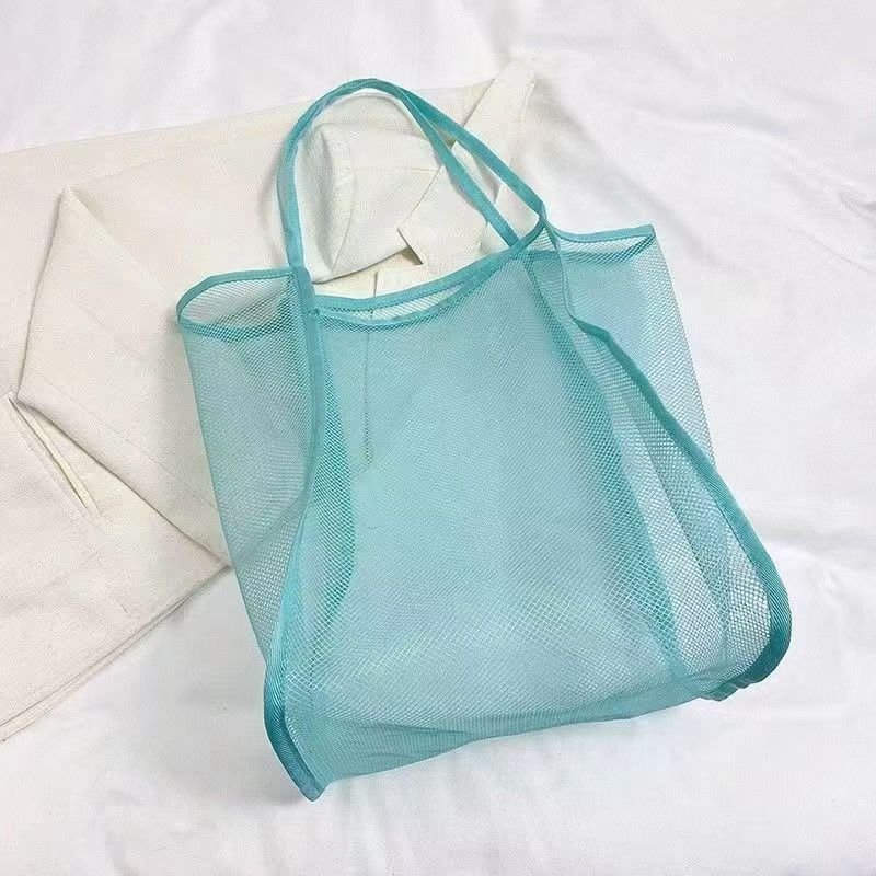 

Wind transparent mesh shoulder bag, hollowed out beach bag, swimming and bathing large capacity mesh toy storage bag синій