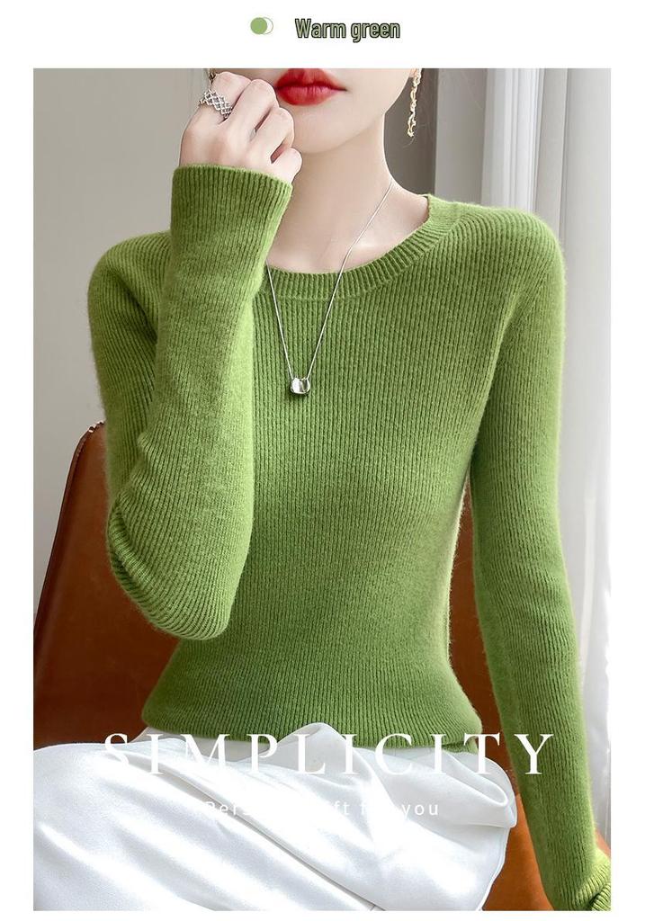 Round Neck Loose Fit Sweater with Seamless Knitting Technology - Comfortable and Slimming Design.