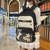 Small fresh contrasting color schoolbag niche design casual versatile children's backpack high value light burden reduction shoulder