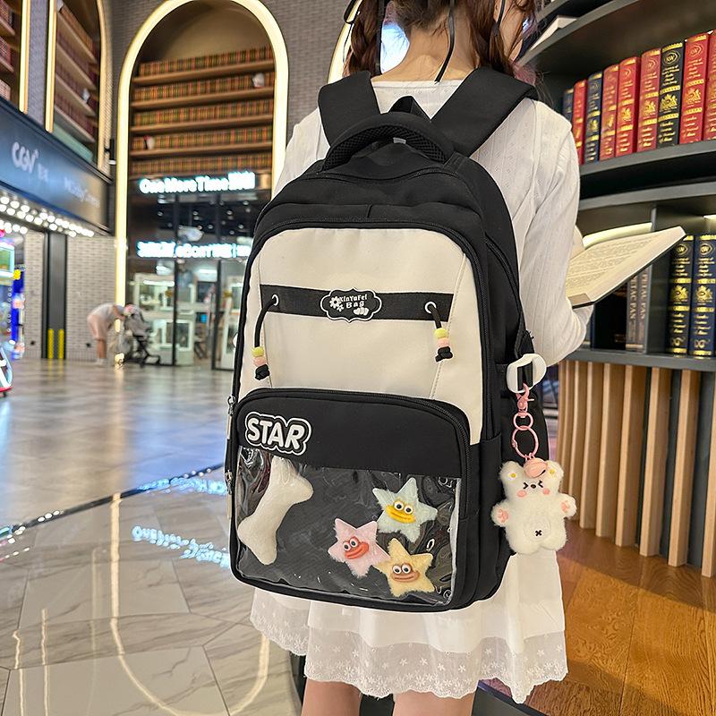 Small fresh contrasting color schoolbag niche design casual versatile children's backpack high value light burden reduction shoulder