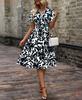 2026 spring and summer short-sleeved V-neck leaf print big swing skirt waist dress fairy skirt