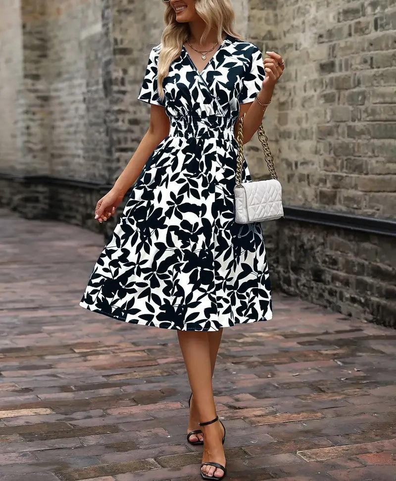 2026 spring and summer short-sleeved V-neck leaf print big swing skirt waist dress fairy skirt