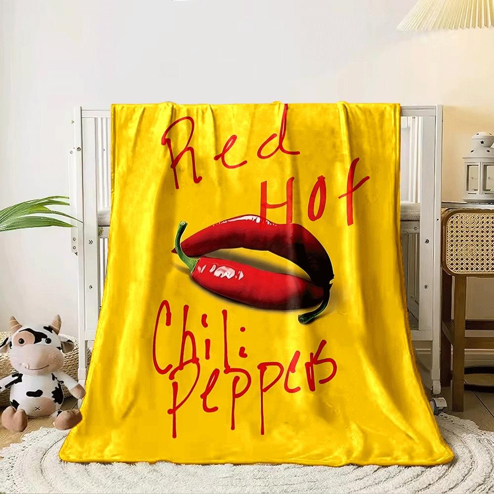 Bold red text and chili peppers resembling lips on a bright yellow background. for all seasons blanket lunch break throw gift 80cm x 120cm