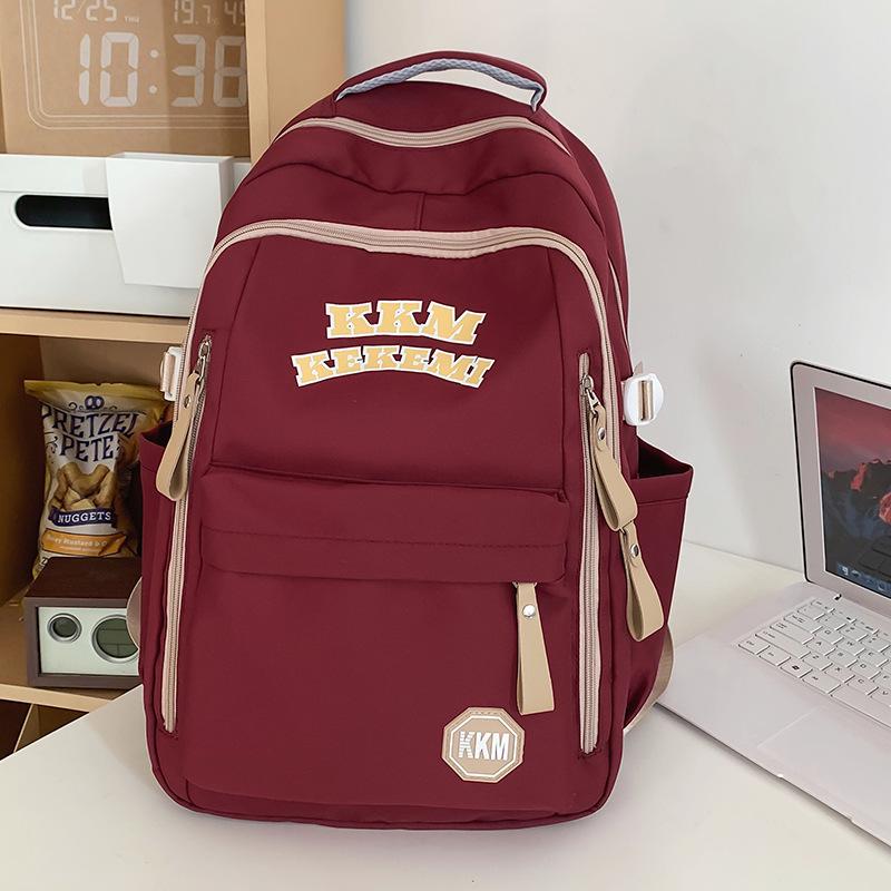 School bag children elementary school students girls junior high school students alphabet backpack college students