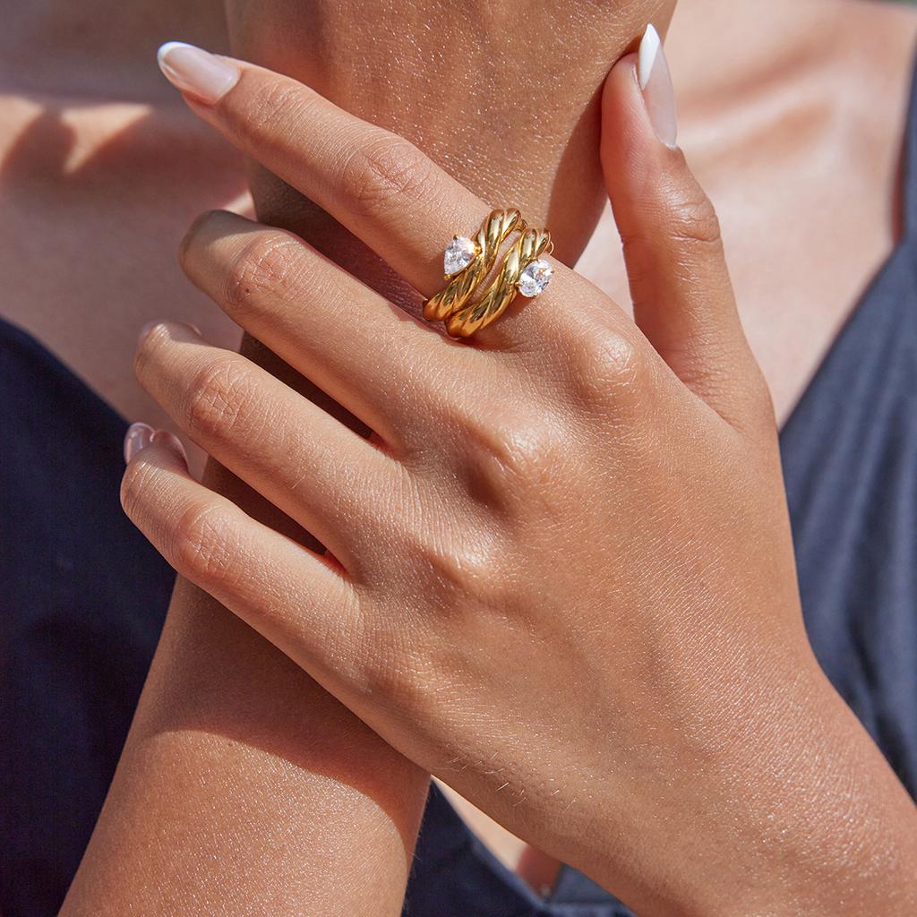 Youthway Minimalist Twisted Design Stainless Steel Ring With White Teardrop Zirconia Women Ring Suitable For Parties And Wedding