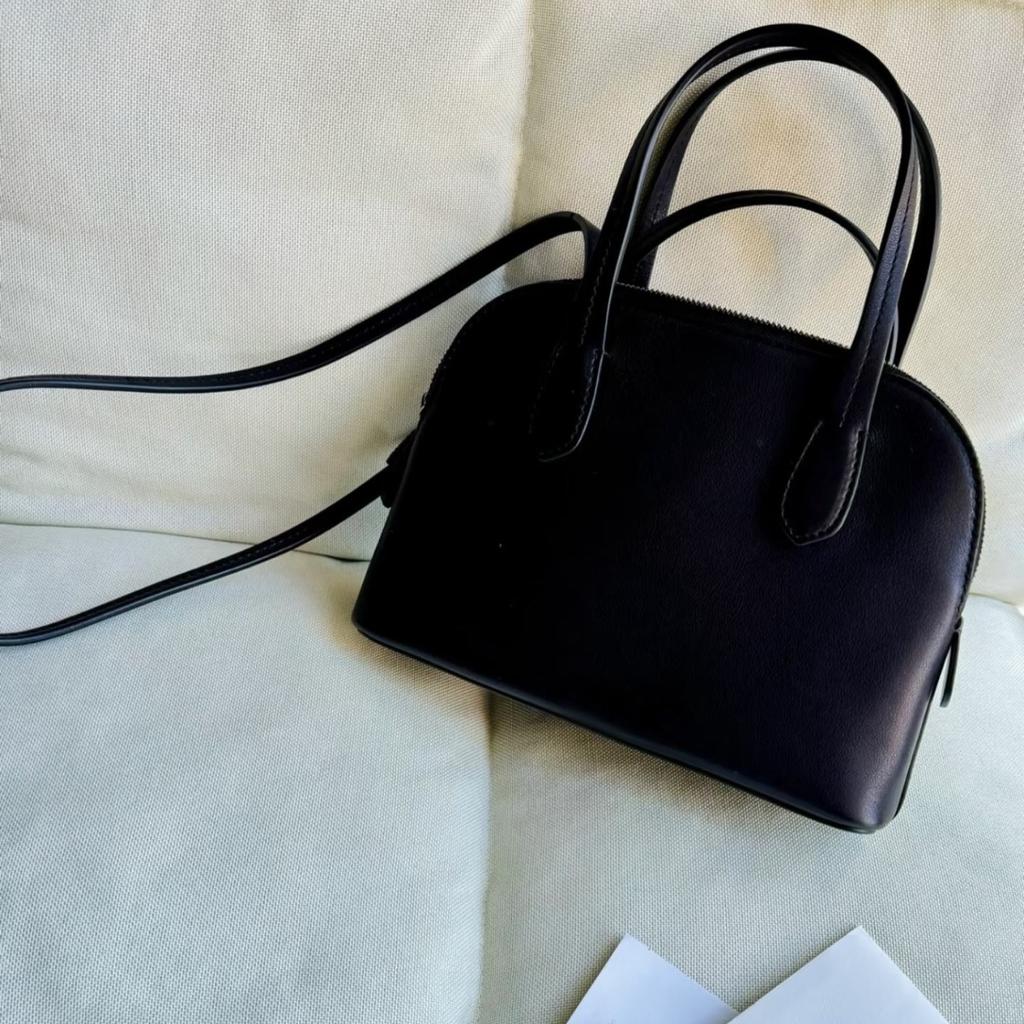 Niche first-layer cowhide minimalist 2026 new spring and summer shell bag single shoulder crossbody portable commuter bowling bag