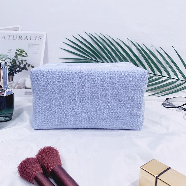 Trending Waffle Cosmetic Bag: Solid Color, Spacious, Women's Handheld Toiletry Organizer