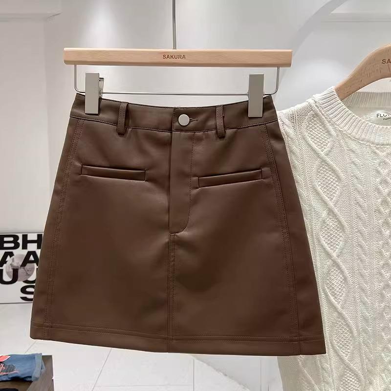 

Юбка А-силуэта из ПУ-кожи с высокой посадкой - Корейский стиль, на одной пуговице, Универсальная для работы 2024 Осень/Зима Женская короткая юбка. XL