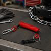 Coiled Trailer Brake Lanyard and Pin Assembly with Red Interlaced Cable, Metal Loop, and Snap Hook for Attachment to the Trailer Connection Point
