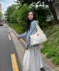 Loveravelive 4 Pocket Ribbon Shoulder Bob Bag (Ivory)